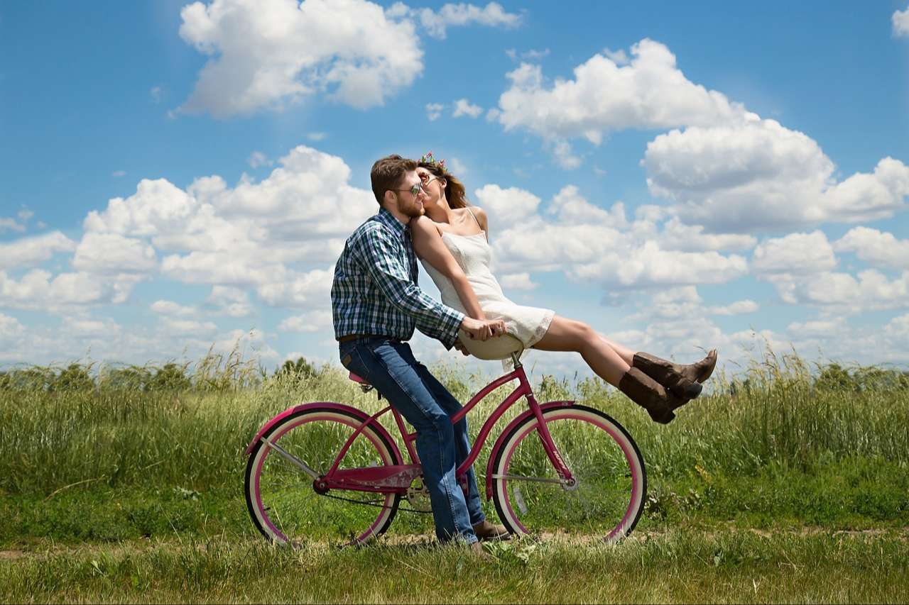 Couple Riding Bicycle